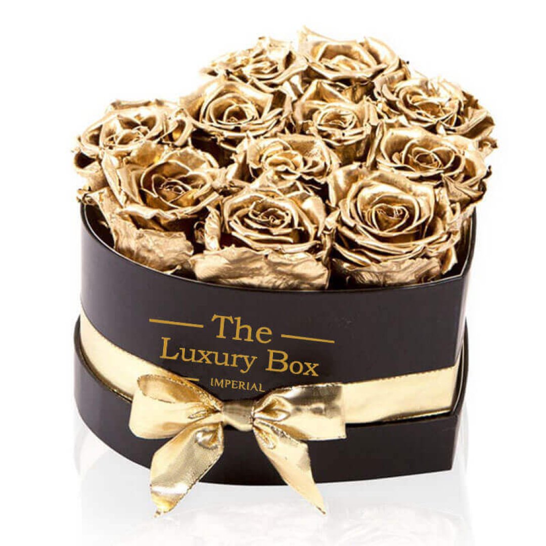 Boite de roses éternelles en or