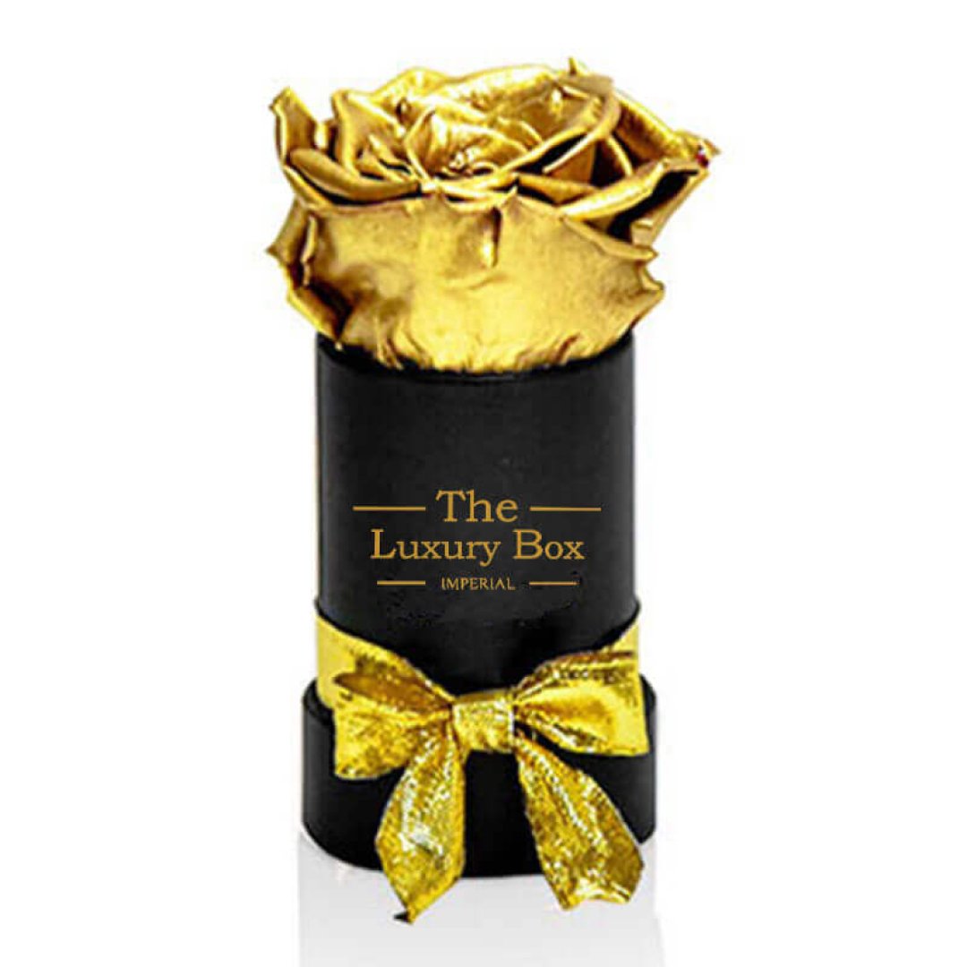 Petite boite de rose en or